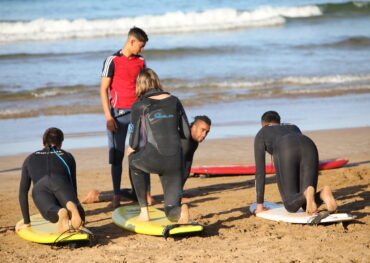 surf lessons in taghazout beach with instructors