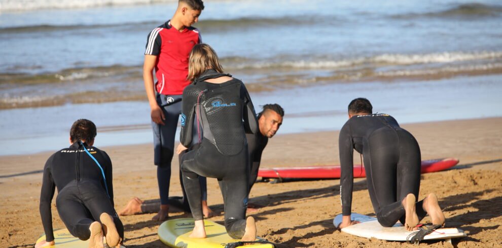 surf lessons in taghazout beach with instructors